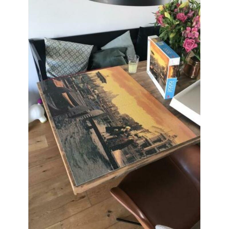 7 x 1000 stukjes en 1 x 2000 stukjes puzzle