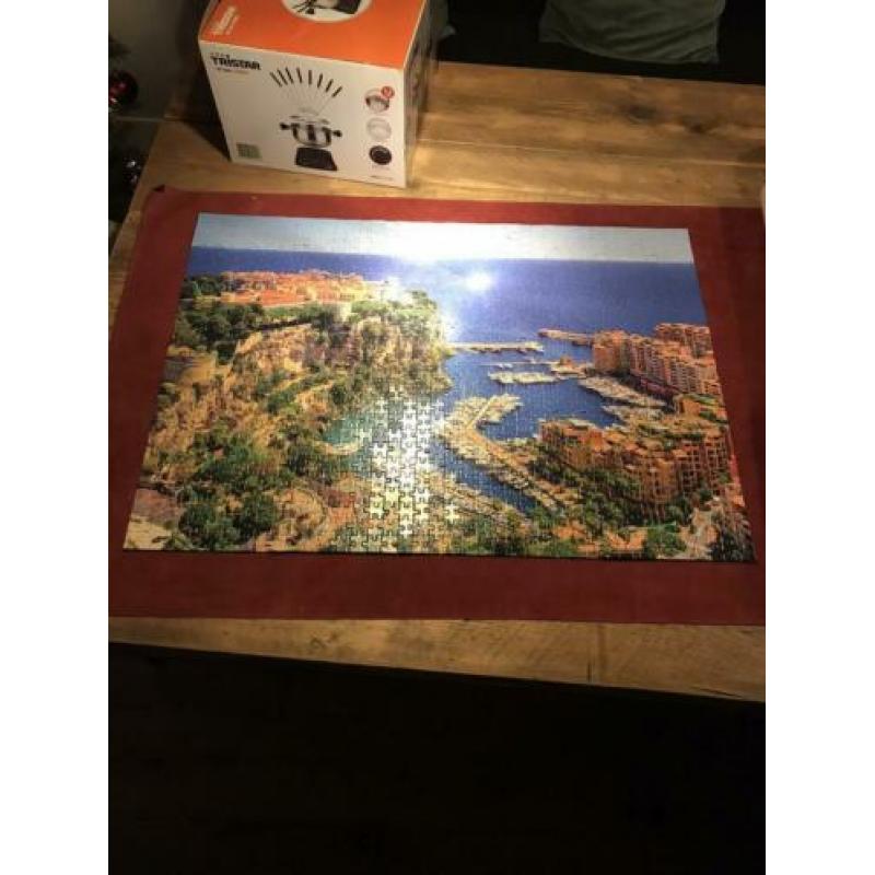 7 x 1000 stukjes en 1 x 2000 stukjes puzzle