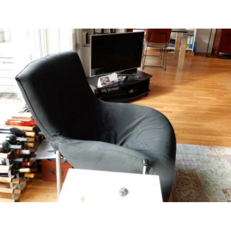 Grote Ikea fauteuil met voetensteun.