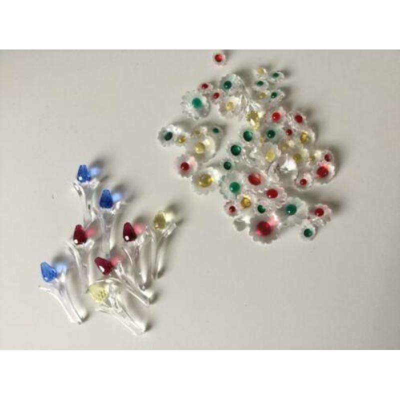 Swarovski schelp en bloemetjes.