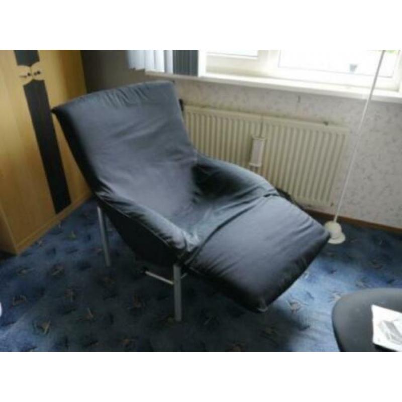 Grote Ikea fauteuil met voetensteun.