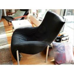 Grote Ikea fauteuil met voetensteun.