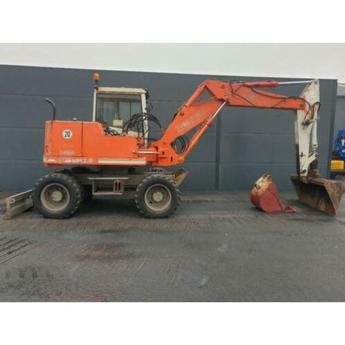 O & K MH 2.8 mobiele kraan banden graafmachine wielkraan