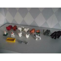 Te koop Duplo set: 13 boerderij dieren + trog / spade
