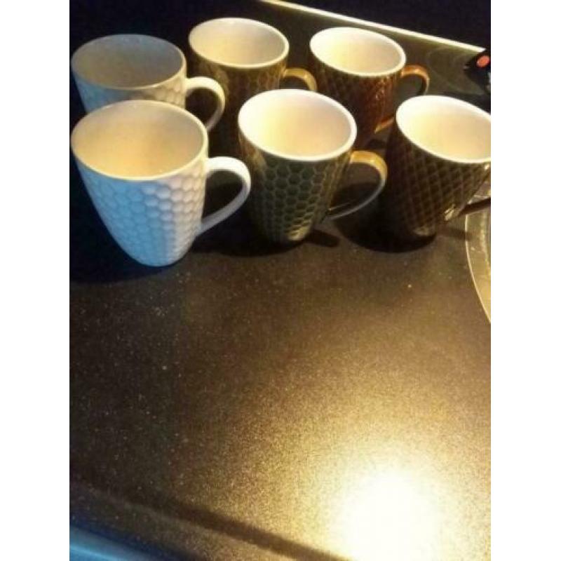 6 aardewerk koffiekopjes