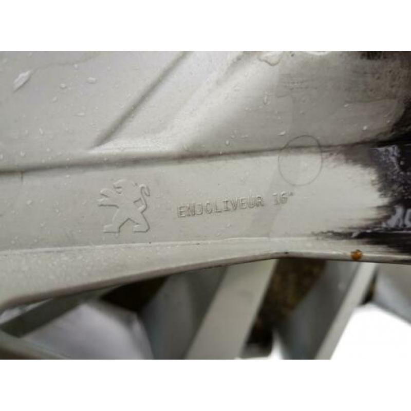 Zo goed als nieuwe Peugeot wieldoppen en Peugeot zonnescherm