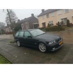Nette BMW 3 serie E36 Touring M Sport met nieuwe APK