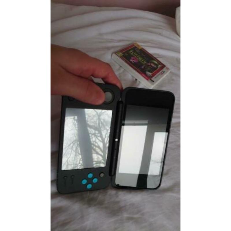 nintendo 2ds xl. Met Luigi's mansion 2
