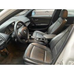 Bomvolle bmw 118i 2008 leer/bi-xenon/schuifdak/18”lm/pdc