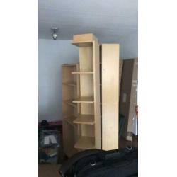 Drie Ikea kasten waaronder een hoekkast