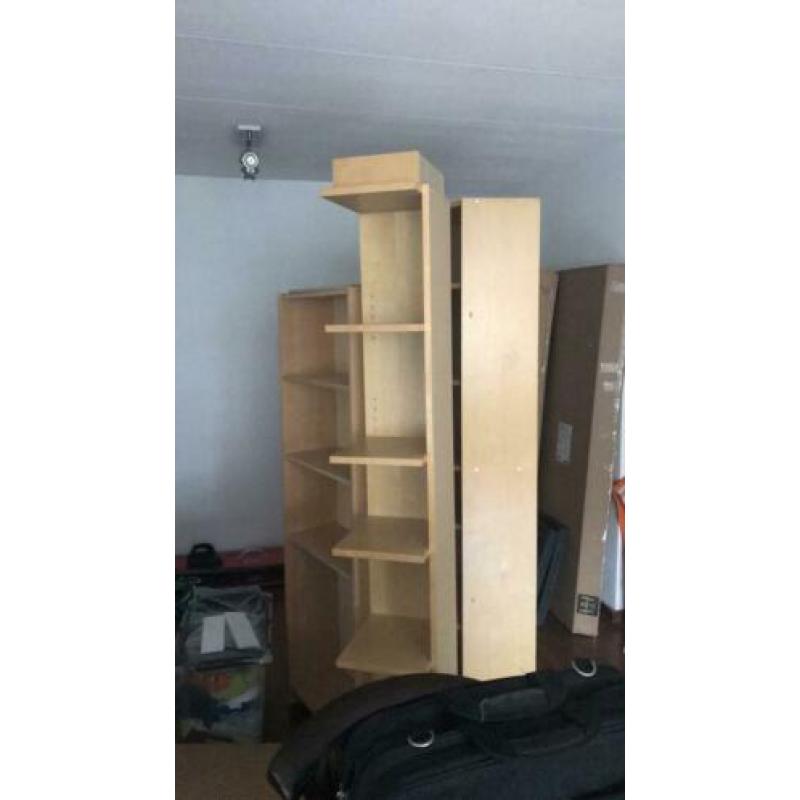 Drie Ikea kasten waaronder een hoekkast
