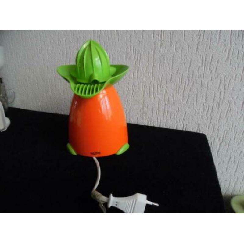 Citruspers en weegschaal