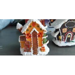 Kerst snoephuisjes met lampjes op stroom